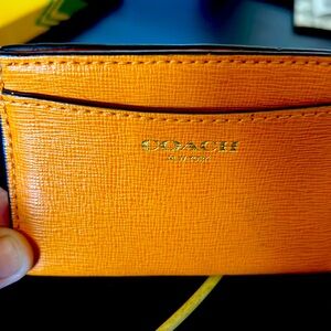 Coach card holder.  Orange, like new